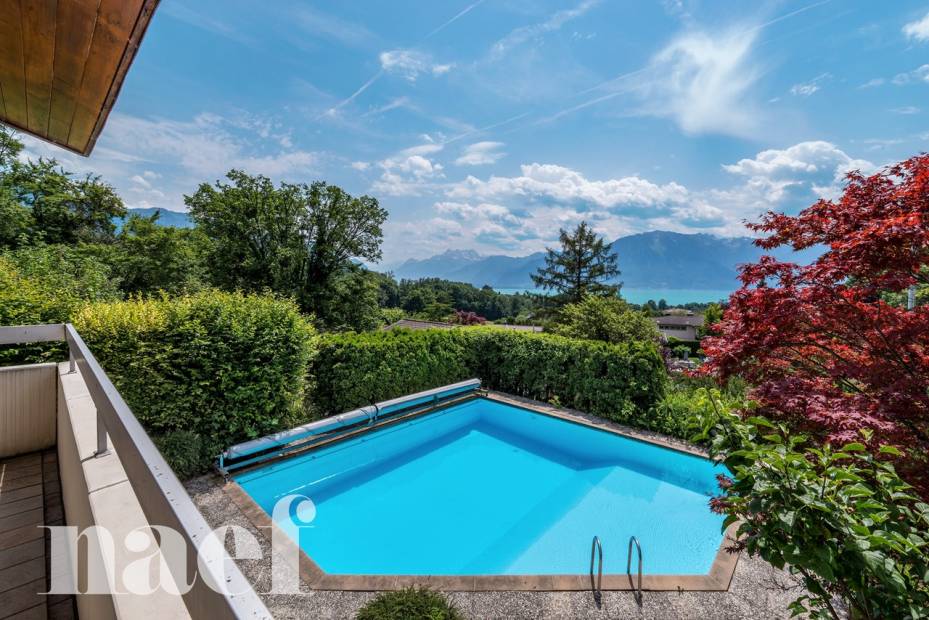 Belle villa avec vue sur le lac de 7.5 pièces dont un studio indépendant : Potentiel exceptionnel à révéler !